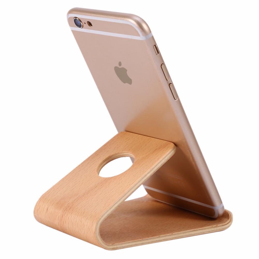 http://little-everyday-things.co.uk/cdn/shop/products/wooden-phone-stand-29881914949812.jpg?v=1628182745